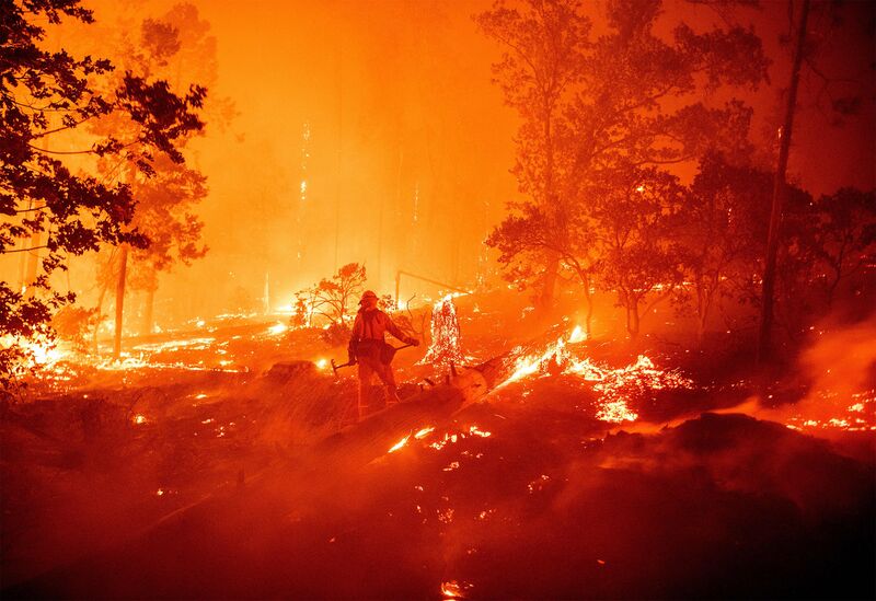 A firefighter works during the Creek Fire in Madera County, California on Sept. 7.