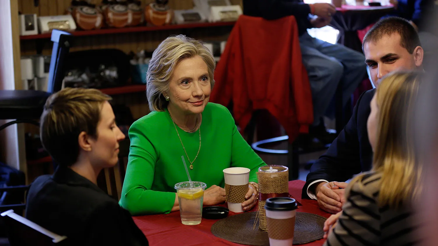Democratic presidential candidate Hillary Rodham Clinton meets with local residents at the Jones St. Java House, Tuesday, April 14, 2015, in LeClaire, Iowa.
