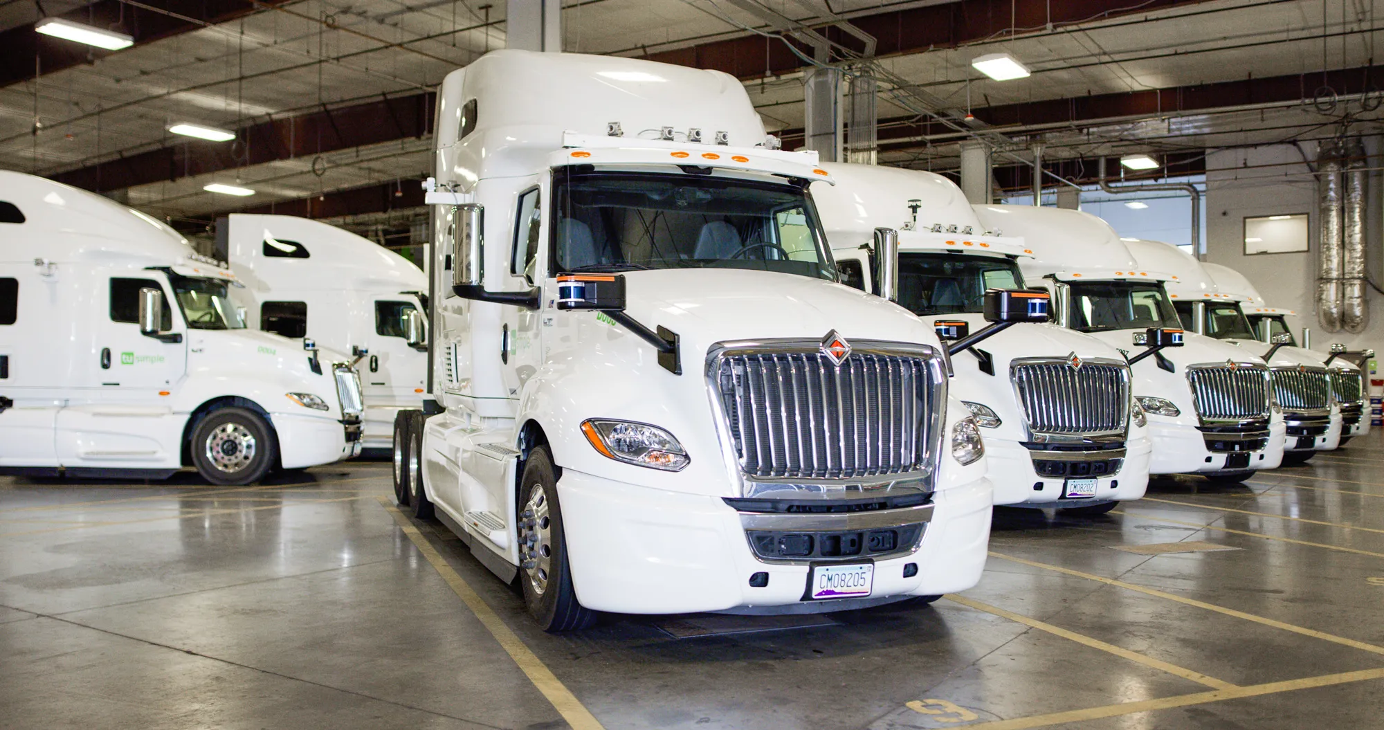 A fleet of TuSimple autonomous trucks.