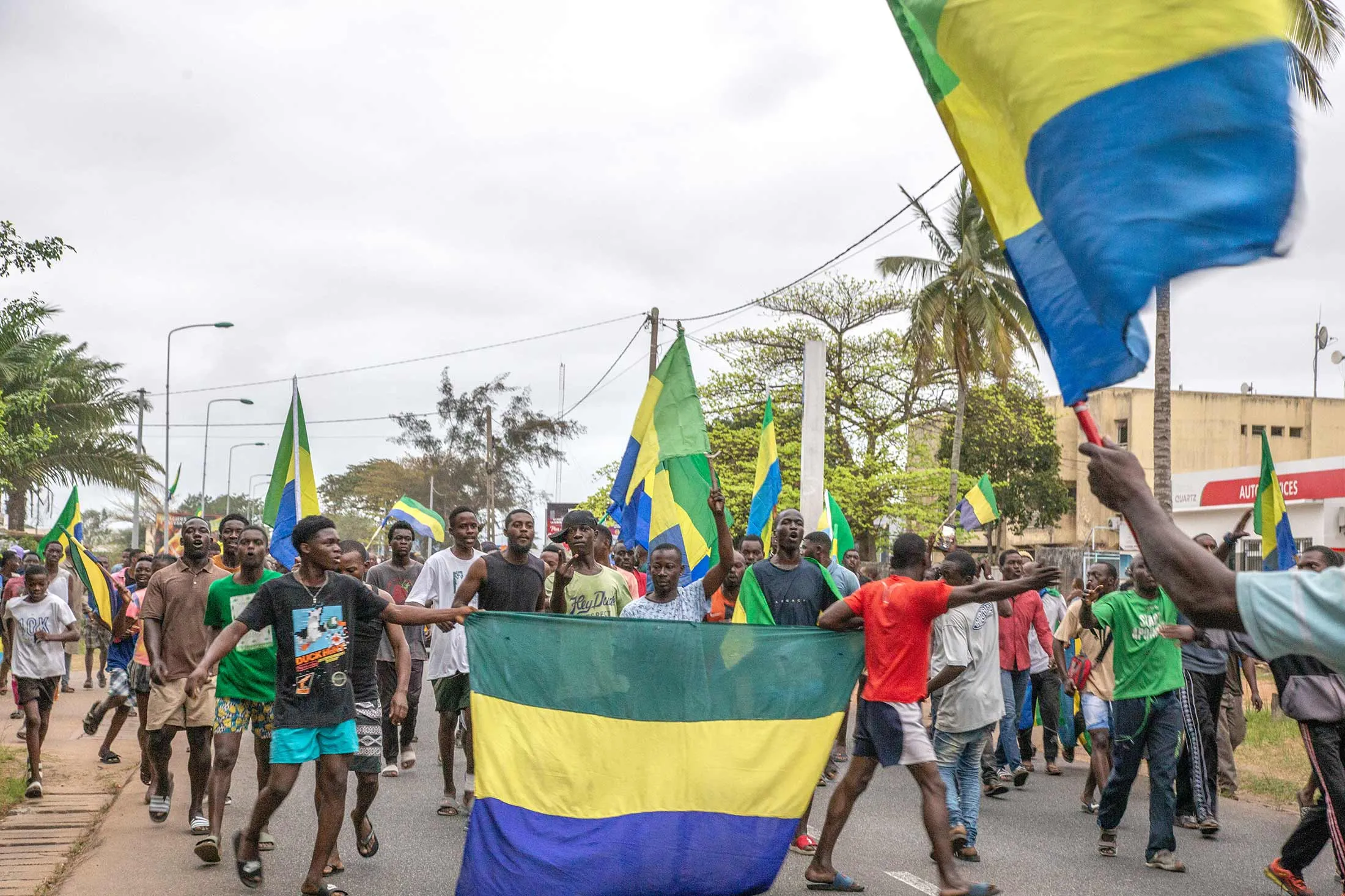 A crowd in Gabon celebrates the military coup that deposed President Ali Bongo Ondimba in August.