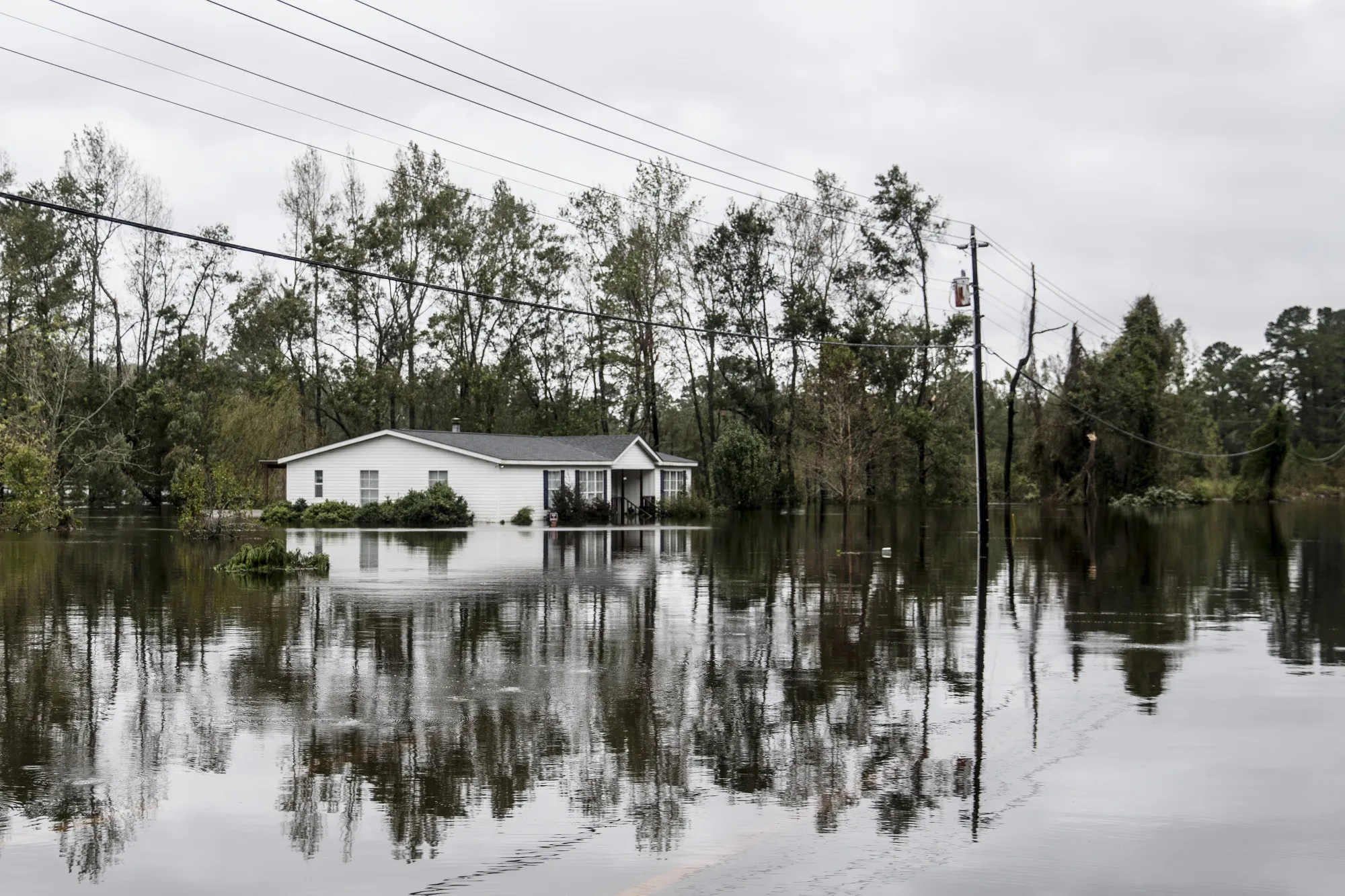 A home stands in a flooded neighborhood after Hurricane Florence hit in Castle Hayne, North Carolina,&nbsp;on&nbsp;Sept. 16.