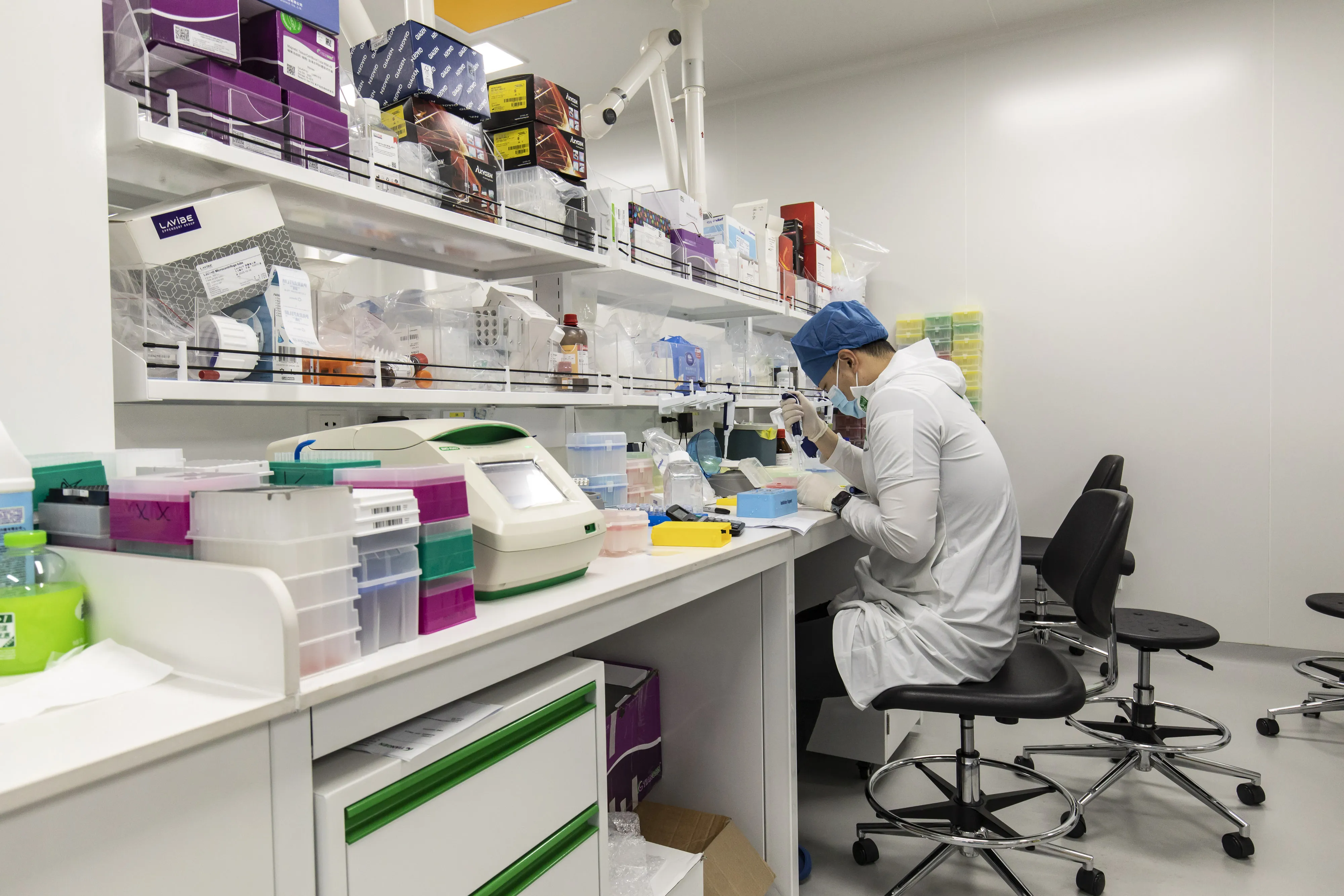 A technician operates at a lab in Insilico Medicine's research facility in Suzhou, China.