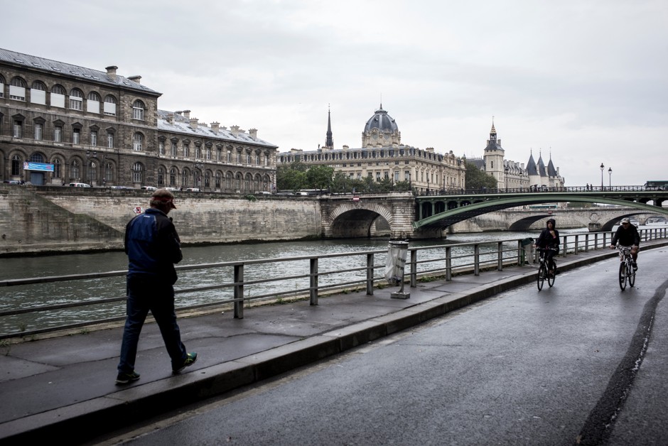 A man walks on the banks of the River Seine during &quot;day without cars&quot; in September 2016. The city has since instituted a permanent car ban along the right bank.