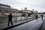 A man walks on the banks of the River Seine during "day without cars" in September 2016. The city has since instituted a permanent car ban along the right bank.