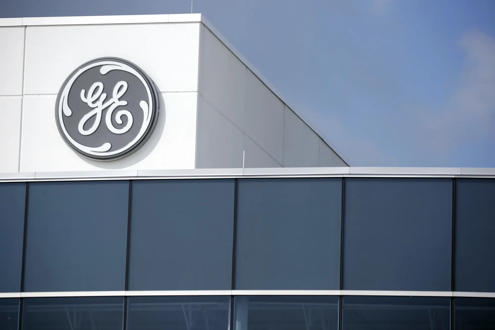 Signage is displayed outside the General Electric Co. (GE) Aviation assembly plant in Lafayette, Indiana, U.S., on Friday, July 19, 2019. General Electric is scheduled to release earnings figures on July 31.