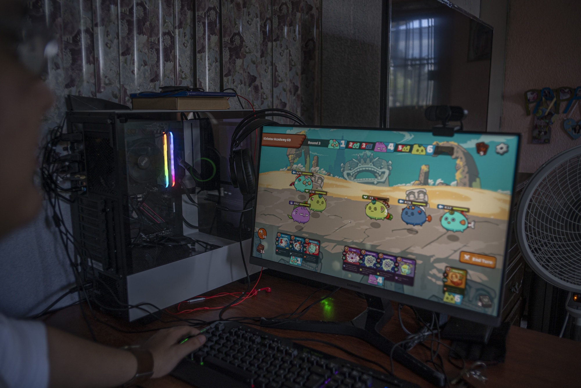 A former medical school student plays Axie Infinity, a NFT-based online video game, at home in Ciudad del Carmen, Mexico.
