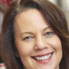 Headshot of Claudine E Adamo