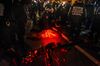 NYPD officers detain a demonstrator at a protest during the 2020 Presidential election in New York.