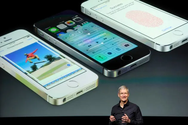 Apple CEO Tim Cook announced two new iPhones, on sale globally Sept. 20