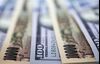 Japanese 10,000 yen and U.S. 100 dollar banknotes are arranged for a photograph in Tokyo, Japan, on Thursday, Sept. 7, 2017. Japanese stocks fell as the yen strengthened while investors prepared themselves for the economic damage that Hurricane Irma may inflict on Florida and mulled U.S. President Donald Trump’s most recent comments on North Korea.
