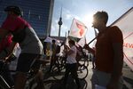 Food-delivery service workers march in protest in Berlin.