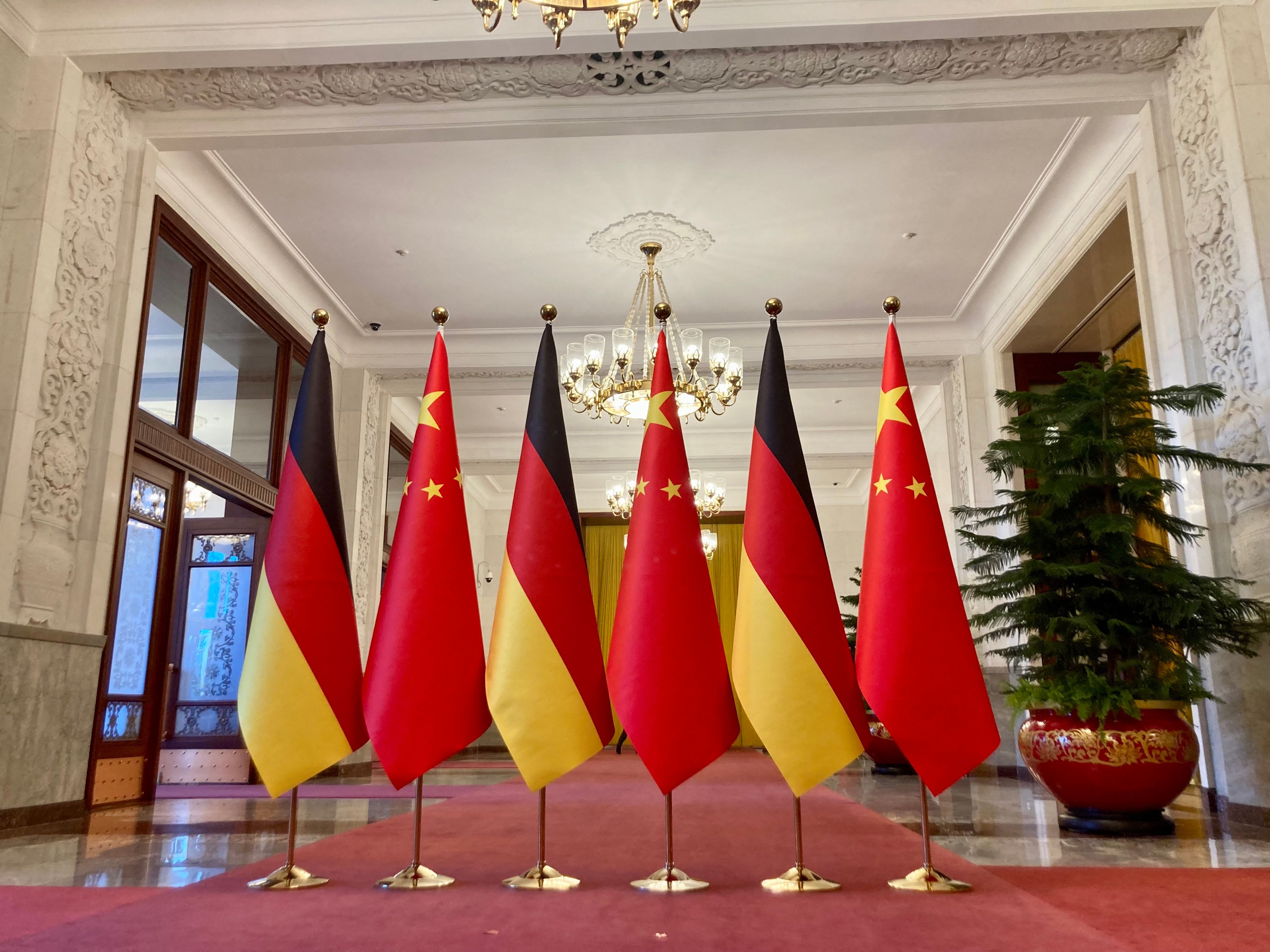 German and Chinese national flags.