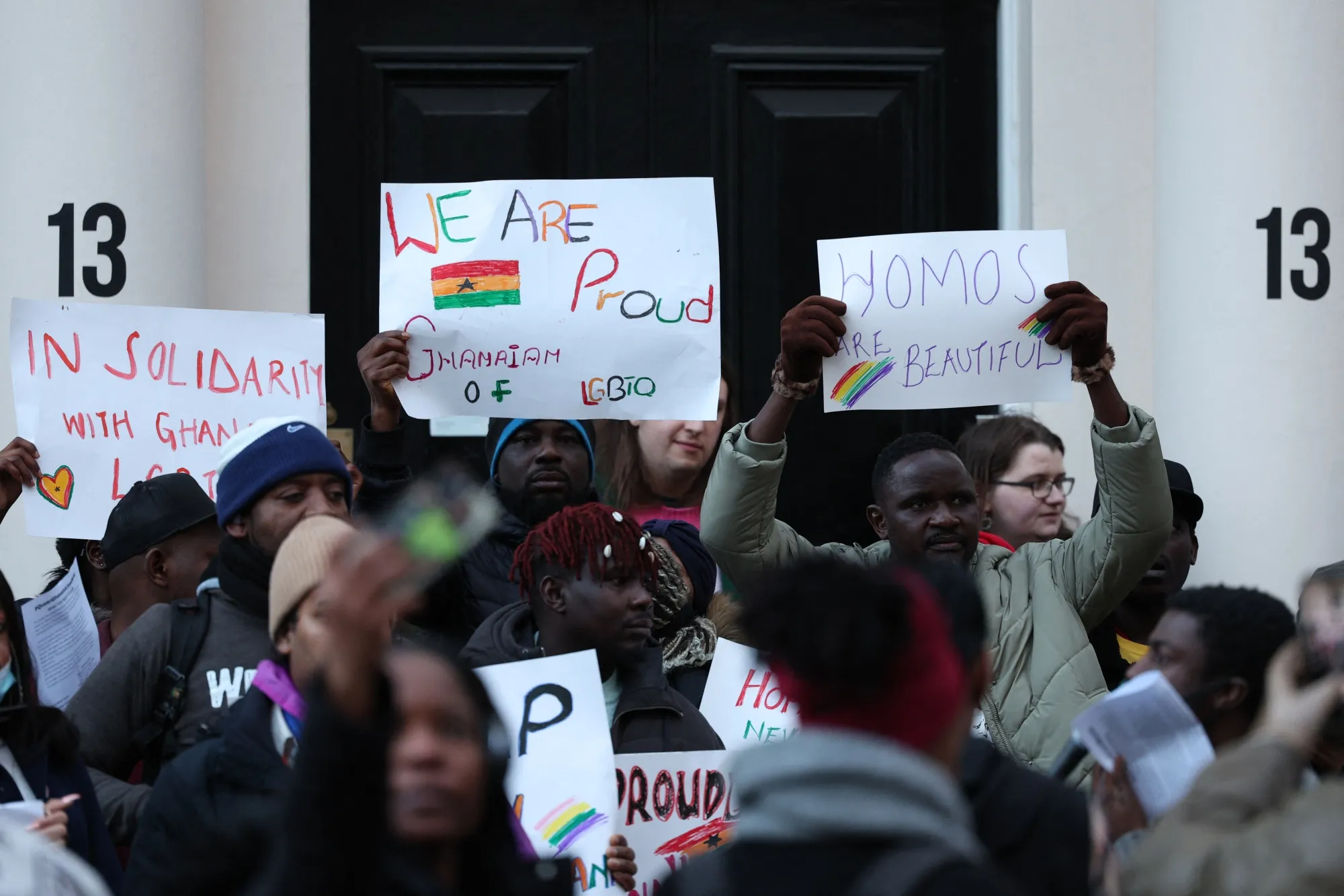 People gather outside the Ghana High Commission in London to protest against Ghana's anti-LGBTQ+ bill on March 6.&nbsp;