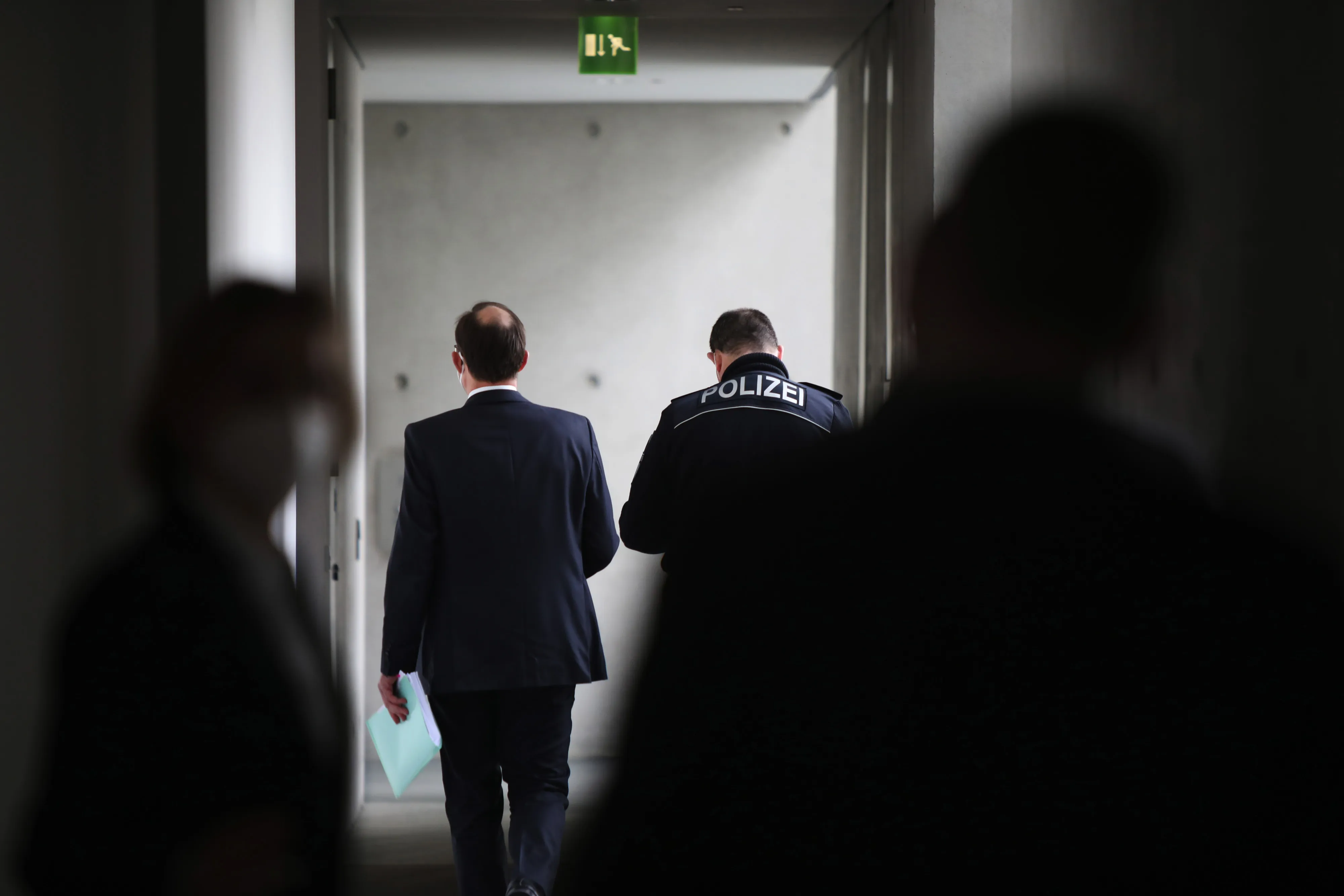 Stephan Freiherr von Erffa, former head of accounting at Wirecard AG, center, departs after giving testimony at the inquiry into the collapse of Wirecard on&nbsp;March 18.