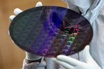 A 300 millimeter silicon wafer at a semiconductor plant in Dresden, Germany.