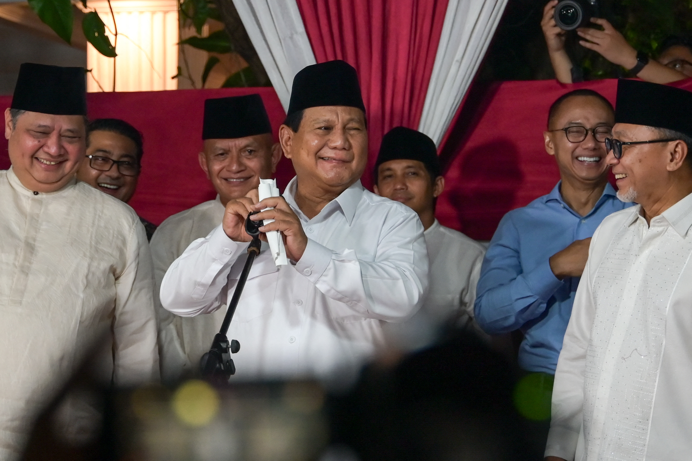 Prabowo Subianto, center, delivers his victory speech at his residence in Jakarta on March 20.