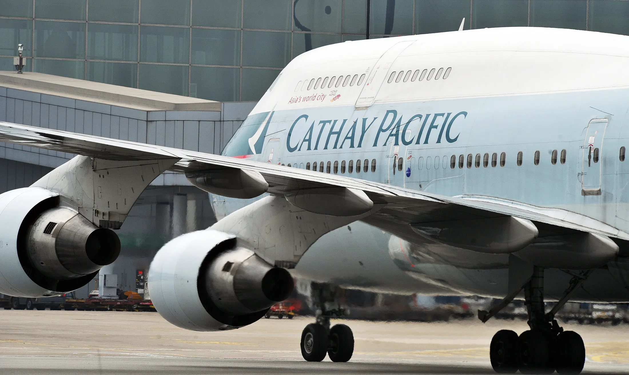 ACathay Pacific Boeing 747 plane taxiing upon its arrival at Hong Kong International Airport.
