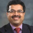 Headshot of Kedar Narayan Upadhye