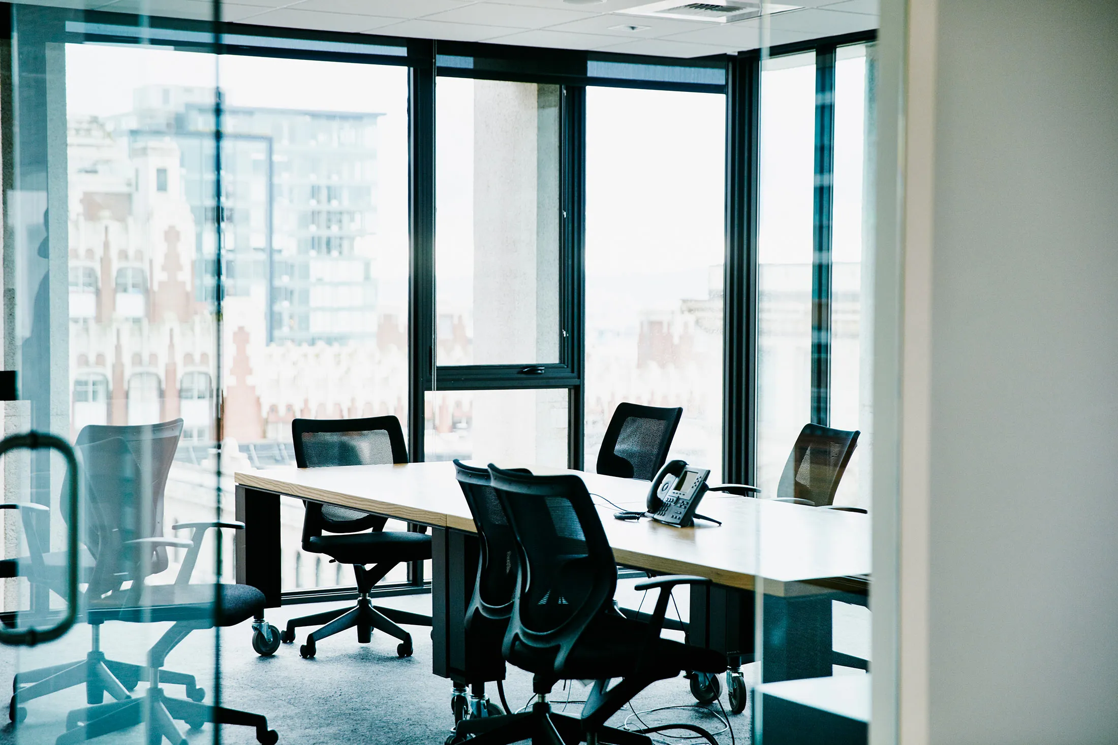 An unusual sight in the modern office: an empty conference room.&nbsp;