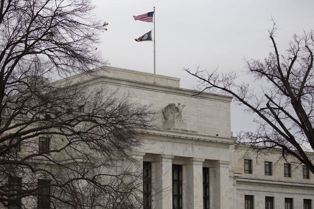 American flag flies outside the U.S. Federal Reserve building in Washington, D.C., U.S.