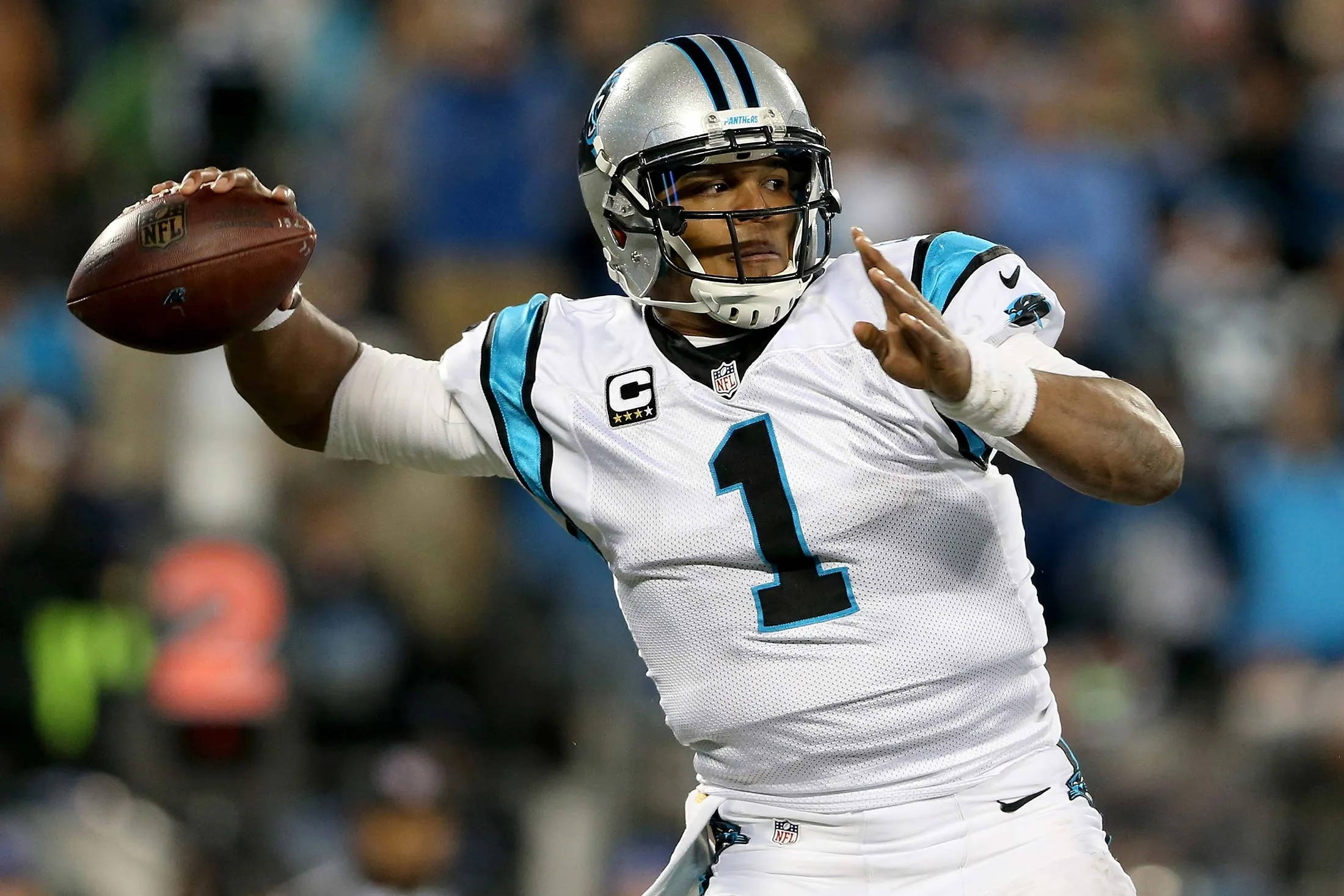Cam Newton #1 of the Carolina Panthers throws a pass in the first half against the Arizona Cardinals during the NFC Championship Game in Charlotte, North Carolina, on Jan. 24.
