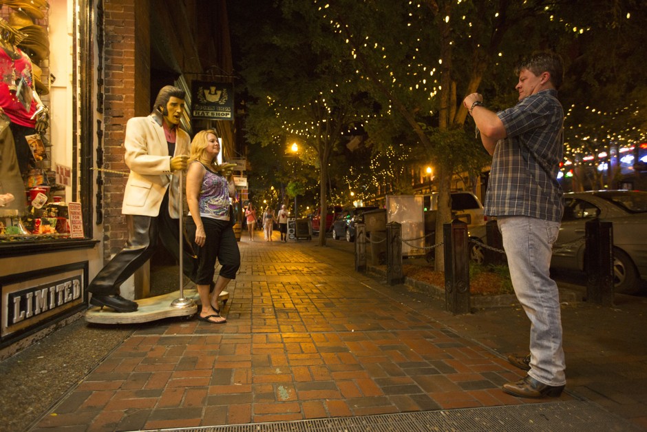 Visitors pose for a photo with Elvis in downtown Nashville.
