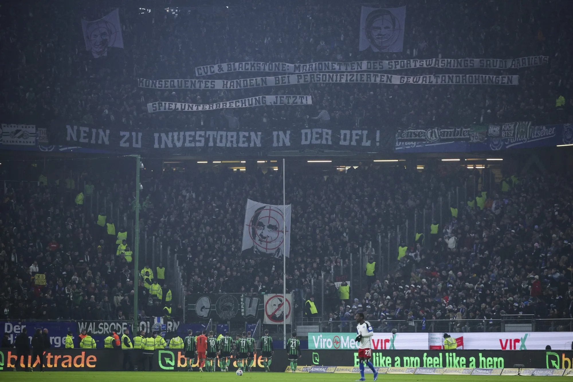 The game between&nbsp;Hamburger SV&nbsp;and&nbsp;Hannover 96&nbsp;was interrupted after Hannover fans showed a banner of Martin Kind, the club’s managing director, behind a crosshairs on Feb. 09.&nbsp;