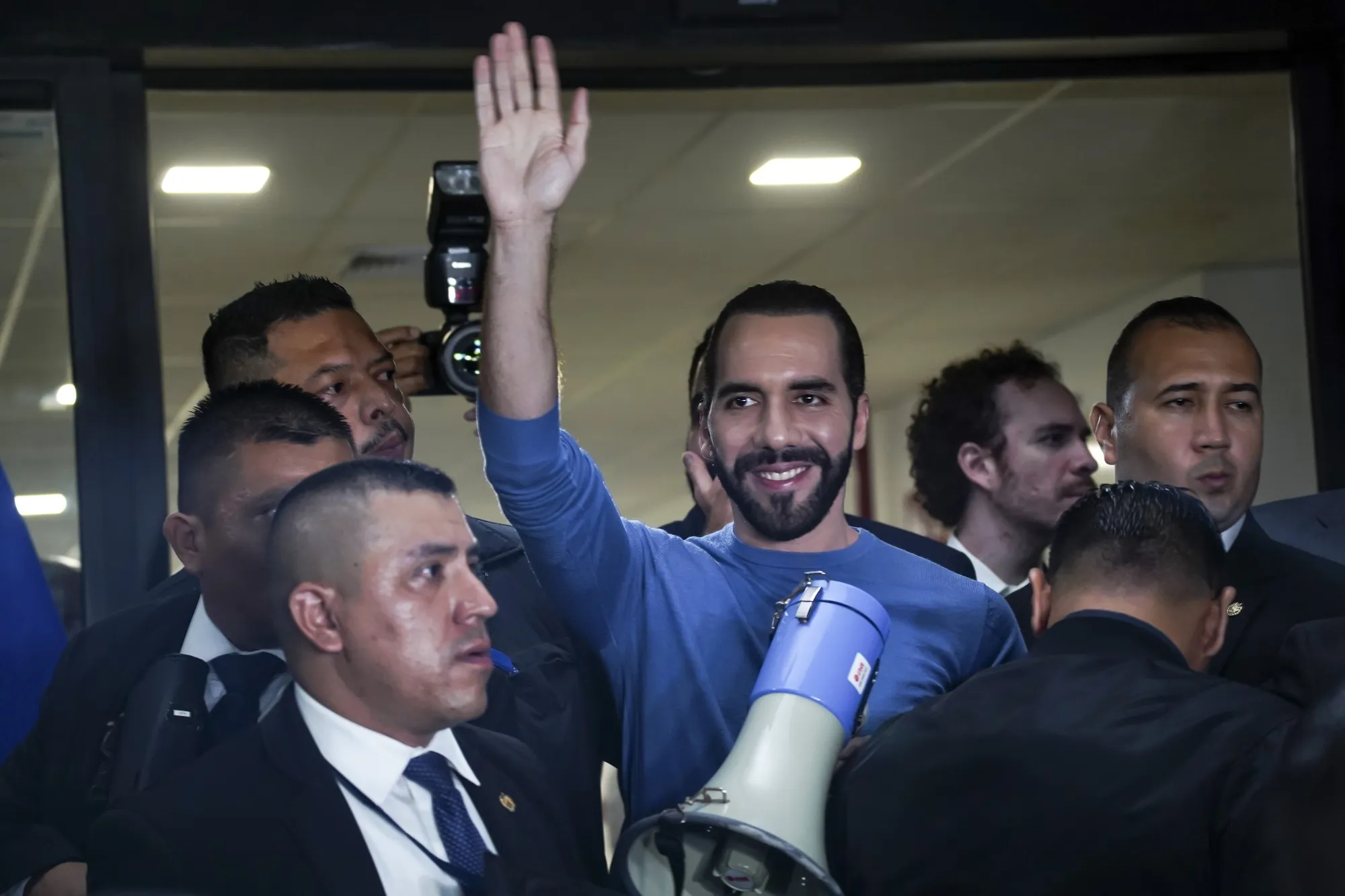 Nayib Bukele waves to supporters outside the Supreme Electoral Court in San Salvador, El Salvador, on Oct. 26.