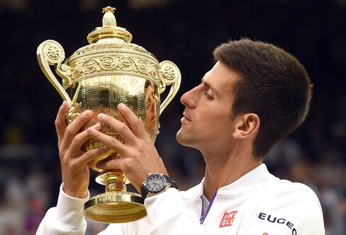 Taking the cup with a Seiko Astron Novak Djokovic Limited Edition on his wrist.