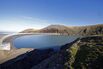 The reservoir which holds the water until power production i
