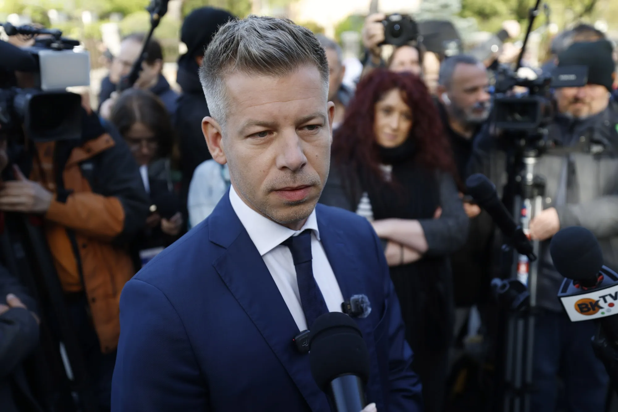 Peter Magyar speaks to members of the media outside a polling station during parliamentary elections, in Budapest on April 12.