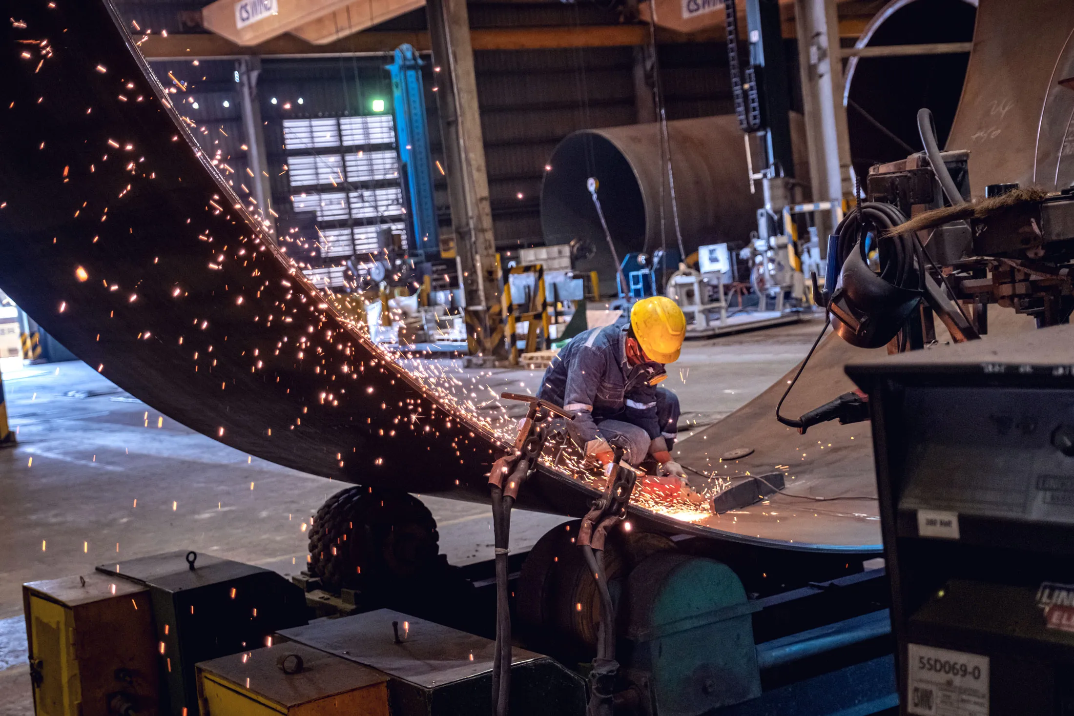 A wind turbine part being welded in Vietnam.