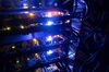 Multicolored lights illuminate a rack of computer server units in the Sberbank PJSC data processing center (DPC) at the Skolkovo Innovation Center, in Moscow, Russia, on Tuesday, Dec. 26, 2017. Sberbank PJSC, Russia’s most valuable company, will boost its dividend payout to 50 percent of profit or higher, just not as quickly as some investors had hoped.