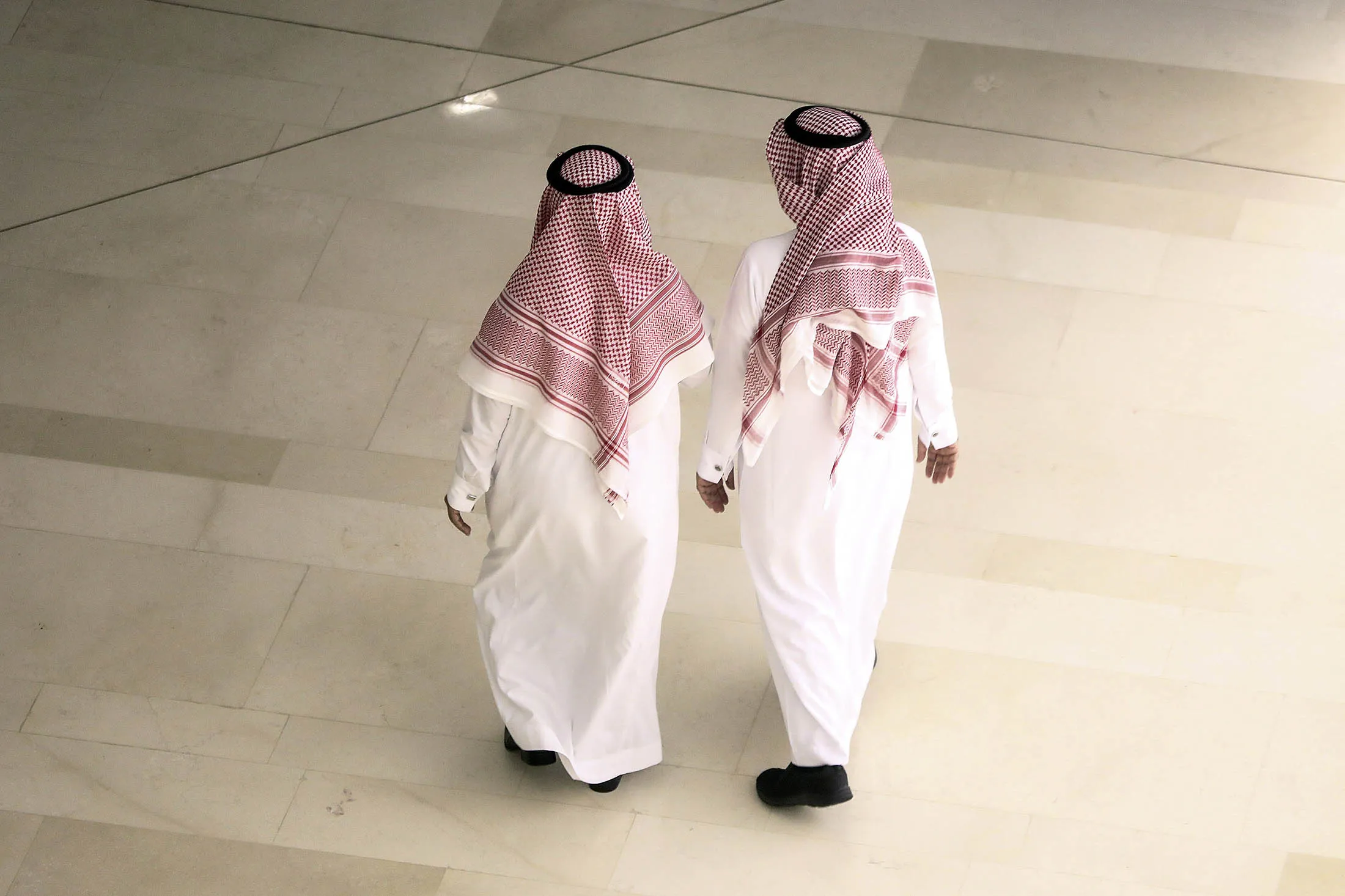 Attendees walk through the King Abdulaziz Center for World Culture during a tour of the project in Dhahran, Saudi Arabia, on Friday, Nov. 25, 2016.
