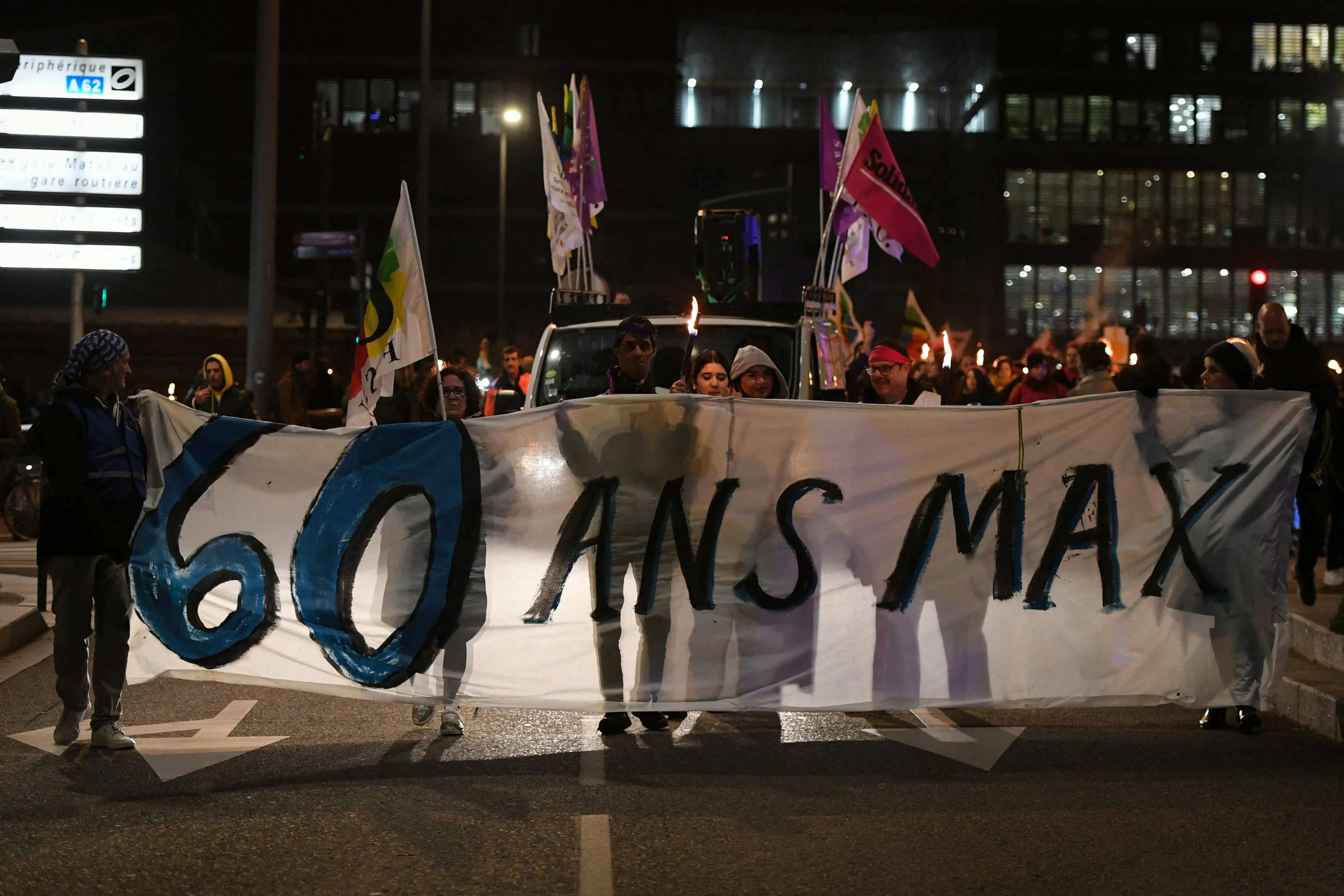 Protesters hold a banner reading '60 years max', during a&nbsp;march&nbsp;in Toulouse on Feb. 2.