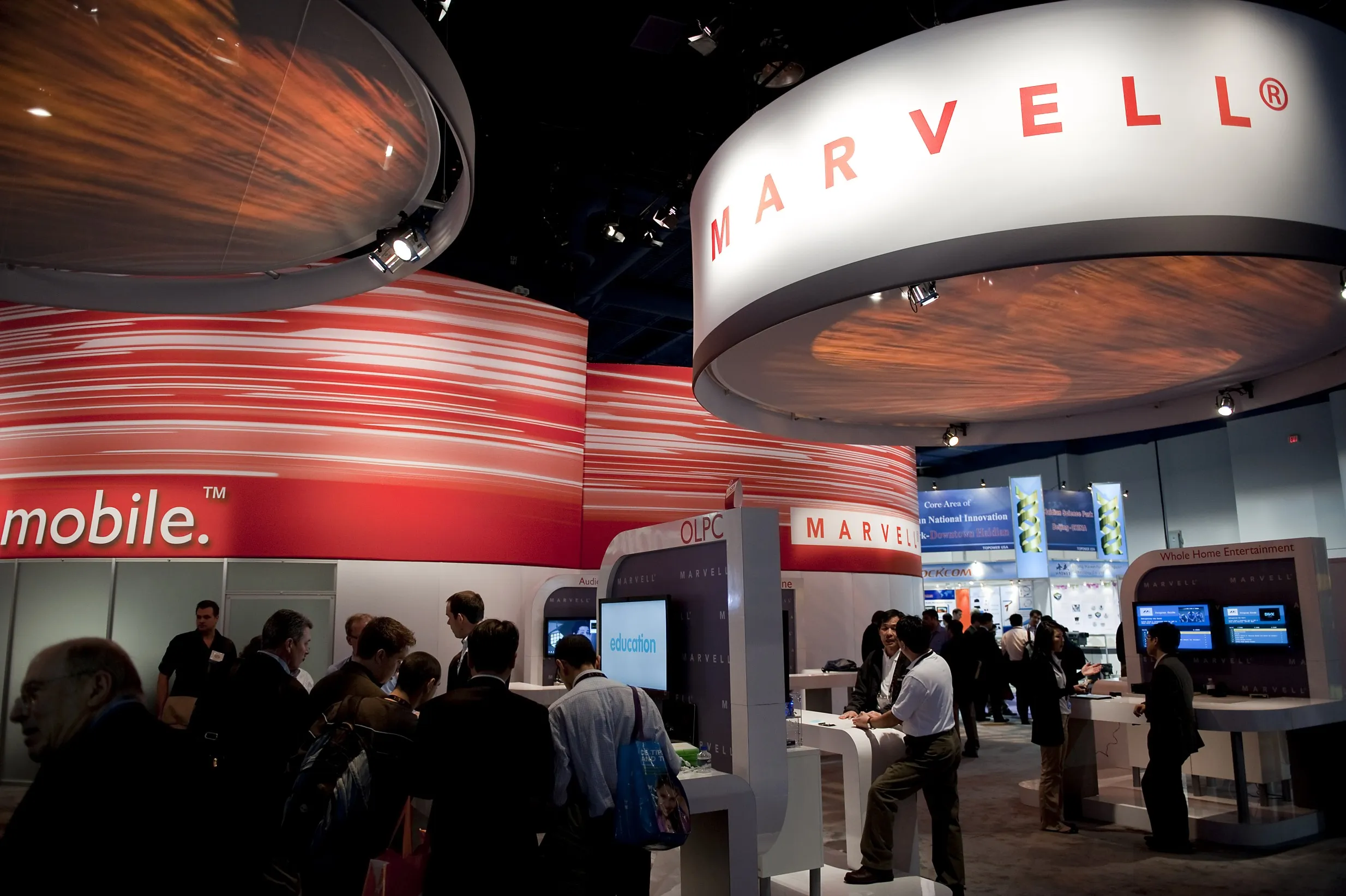 Devices powered by Marvell Technology Group Ltd. chipsets sit on display at the company's booth at the 2011 International Consumer Electronics Show (CES) in Las Vegas, Nevada, U.S., on&nbsp;Jan. 7, 2011.&nbsp;