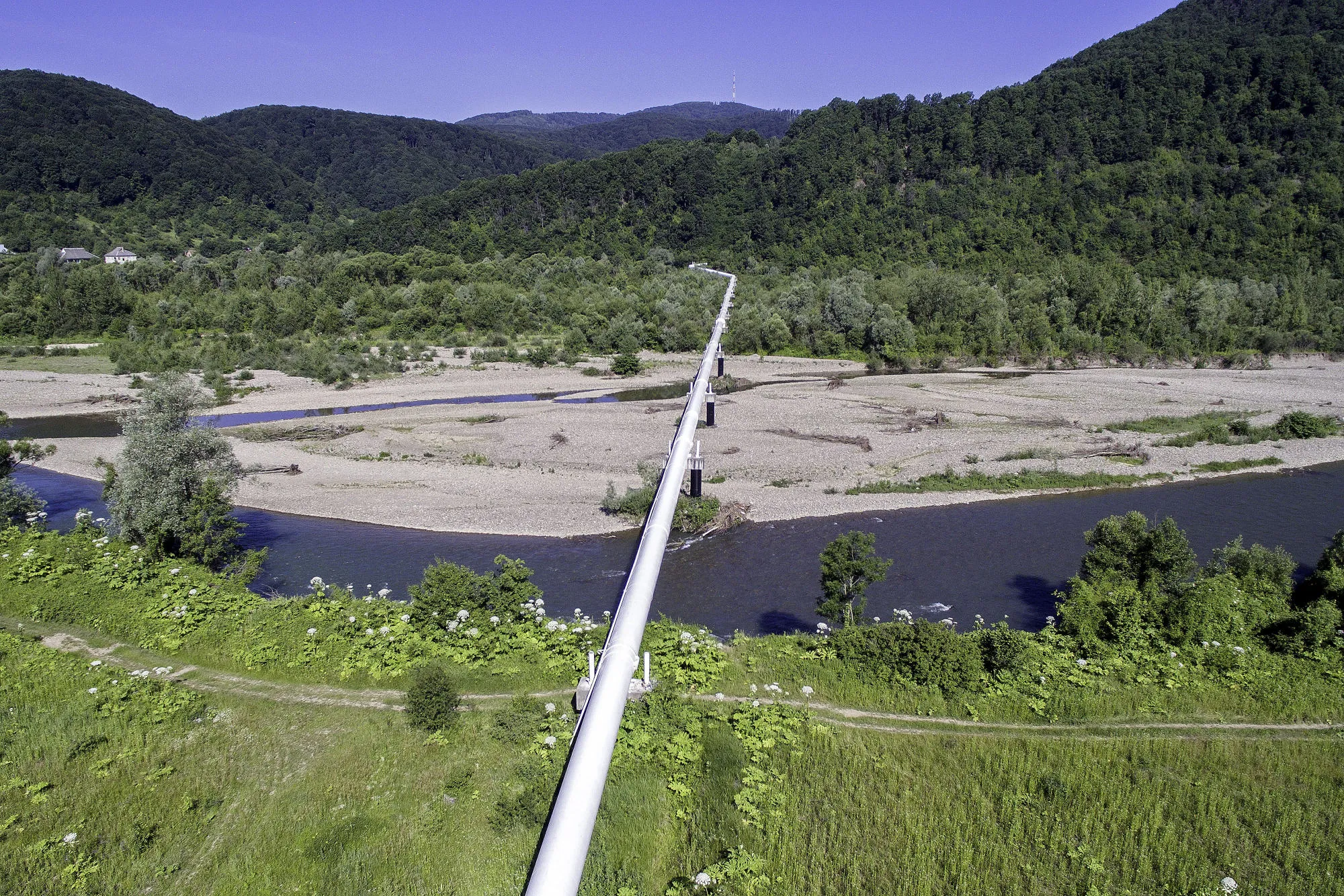 The Trans-Siberian pipeline carries gas supplies across open countryside near Mukachevo, Ukraine.