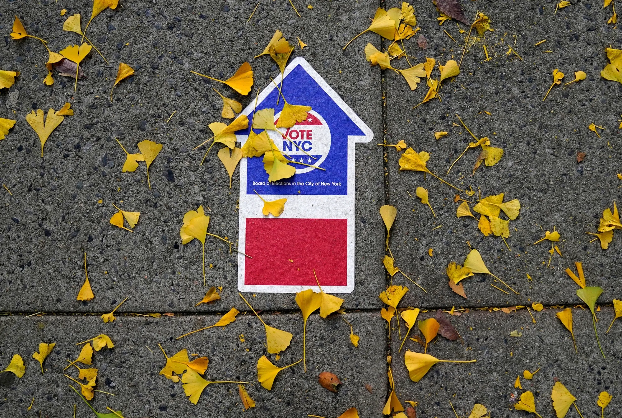 A sticker directs voters to a polling place in New York City on Nov. 8.