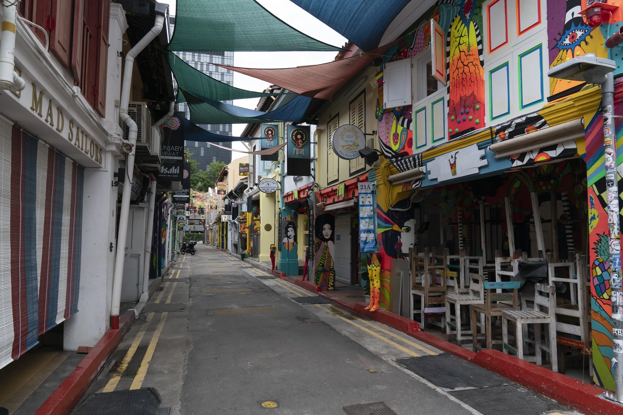 Singapore to Close Schools, Most Workplaces as Virus Spreads