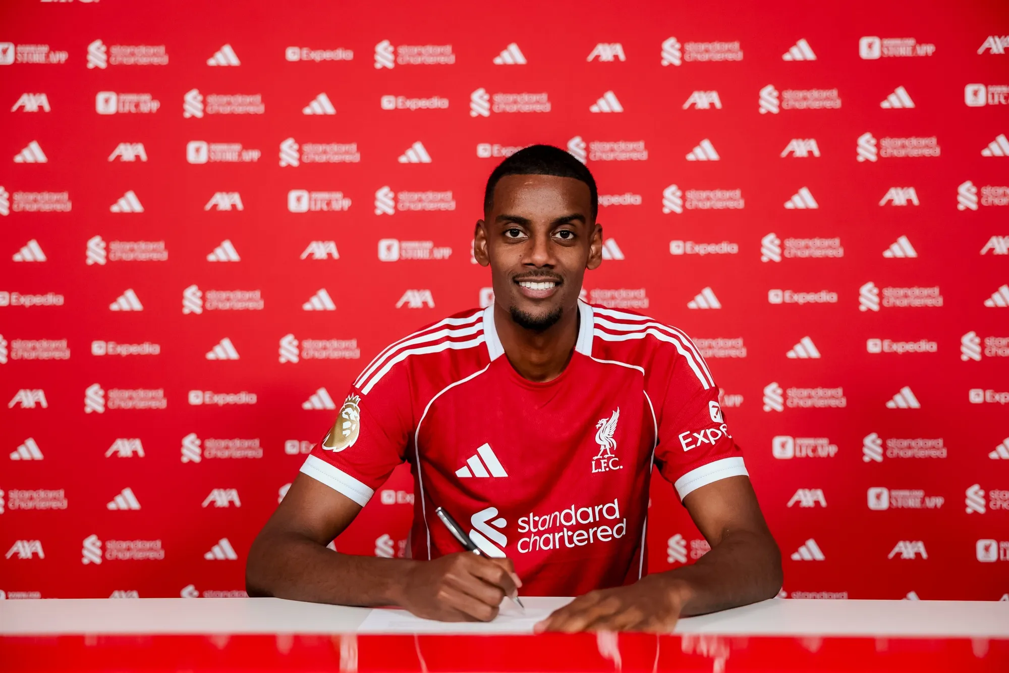 Alexander Isak signing for Liverpool FC.