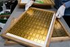 Trays of gold bars