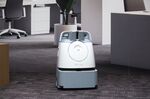 A Whiz autonomous floor-cleaning machine operates during a demonstration.