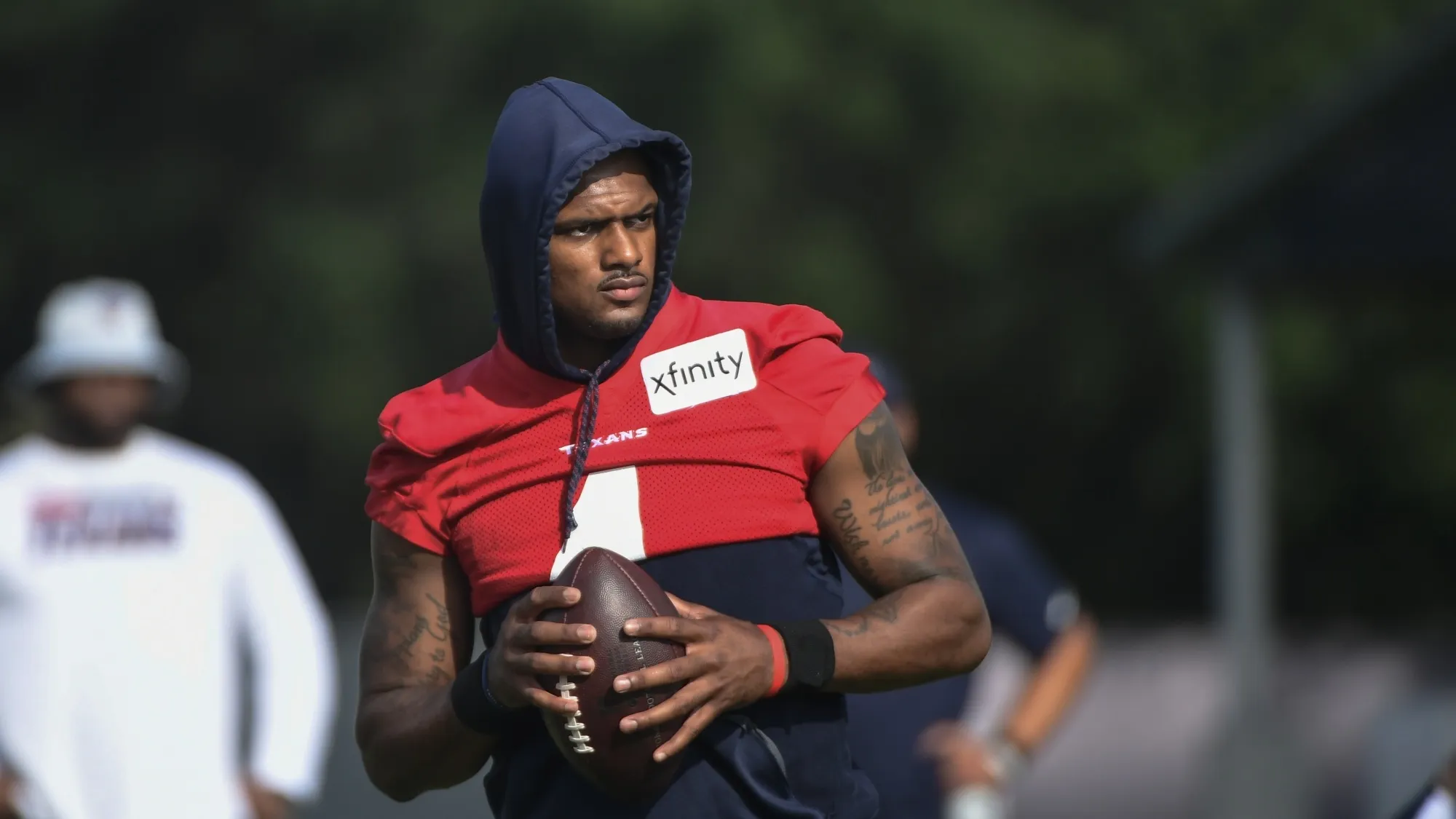 Texans quarterback Deshaun Watson (4) practices with the team during NFL football practice, Aug. 2, 2021, in Houston. Watson's complicated past didn't dissuade the Cleveland Browns from betting on the quarterback's future. He's on Cleveland's roster, and at this point that's the only certainty with the talented yet controversial QB. Watson's stunning trade to the Browns became official Sunday, March 20, 2022 capping a whirlwind few days during in which the three-time Pro Bowler — accused by 22 women of sexual harassment or assault — agreed to come to Cleveland after initially telling the team he wouldn't. (AP Photo/Justin Rex)