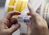 A worker grabs a "Made In The U.S.A." label to affix to a power tool at the Black & Decker Inc. DeWalt brand production plant in Charlotte, North Carolina, U.S., on Wednesday, Aug. 9, 2017. The U.S. Census Bureau is scheduled to release durable goods figures on August 25.
