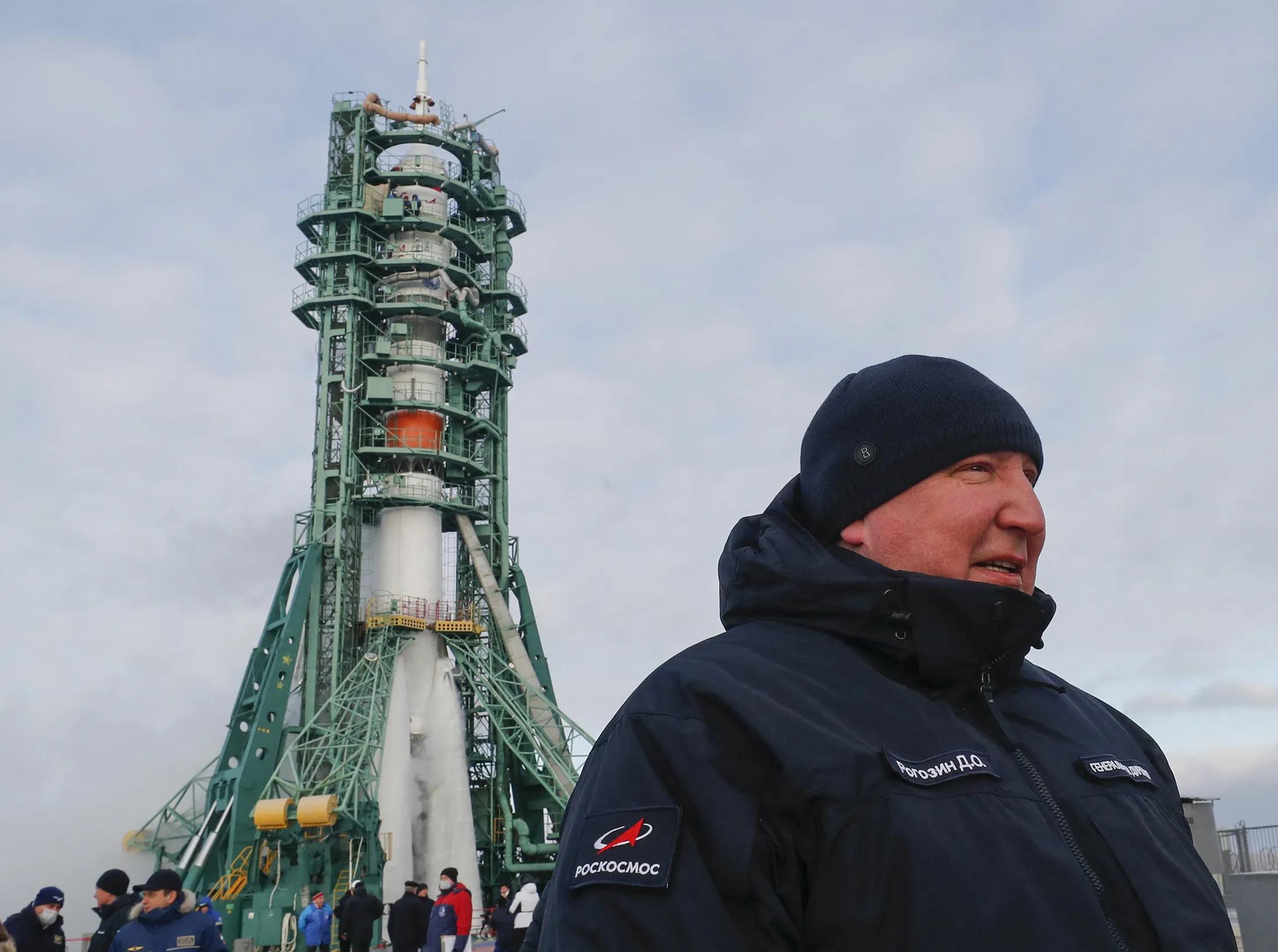 Dmitry Rogozin stands in front of the Soyuz MS-20 spacecraft at the Baikonur cosmodrome on Dec. 8, 2021.