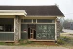 SWANNANOA, NORTH CAROLINA - SEPTEMBER 17: A building that was damaged by Hurricane Helene in 2024 is seen on September 17, 2025 in Swannanoa, North Carolina. Hurricane Helene struck western North Carolina on September 27, 2024, causing at least 108 confirmed deaths in the state, with several people still unaccounted for.(Photo by Allison Joyce/Getty Images)
