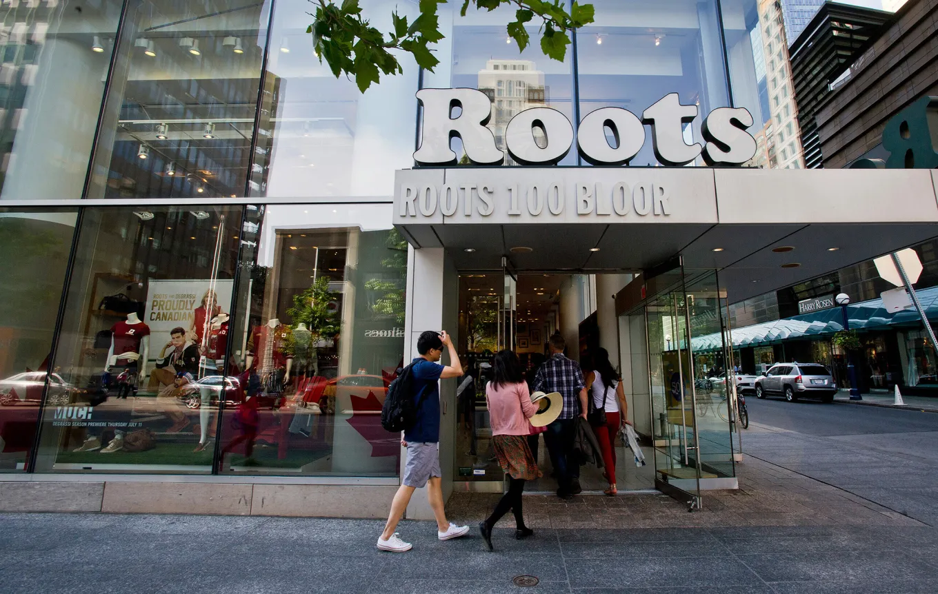 Shoppers enter a Roots store on Bloor Street West in Toronto.
