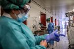 A nurse dresses in personal protective equipment on a ward for Covid-19 positive patients at a hospital in Barcelona, Spain, on&nbsp;April 2.&nbsp;