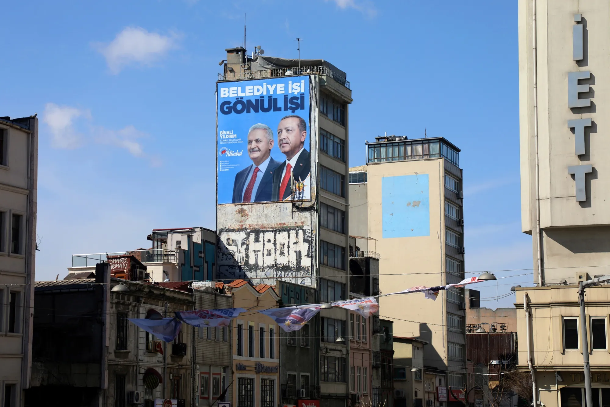 An electoral banner for the AK Party featuring Recep Tayyip&nbsp;Erdogan on a street in Istanbull, March 28.