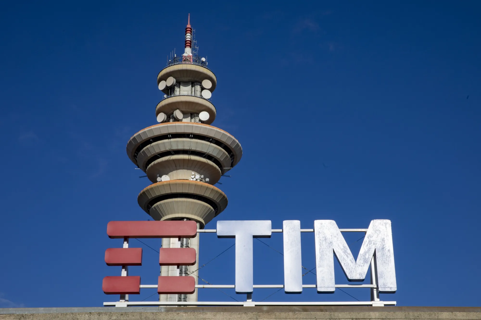 A television communications tower inside the headquarters of Telecom Italia SpA in Rozzano, Italy.